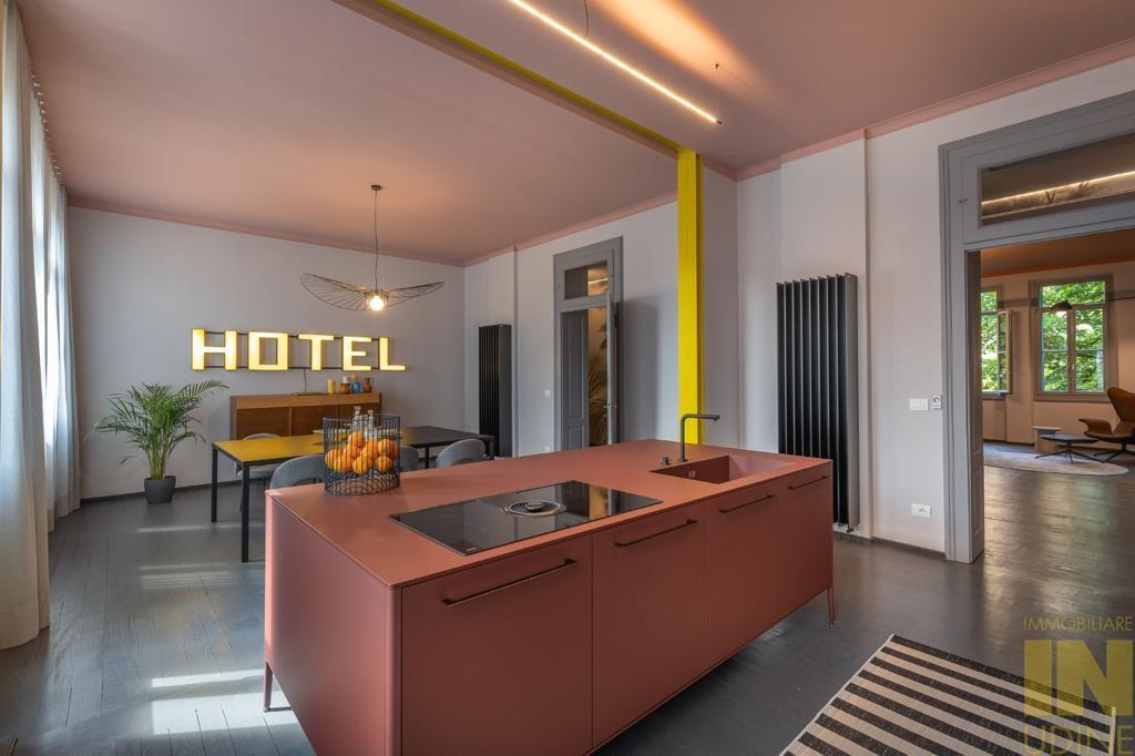 意大利乌迪内历史中心住宅改造，保守与现代的完美融合-1