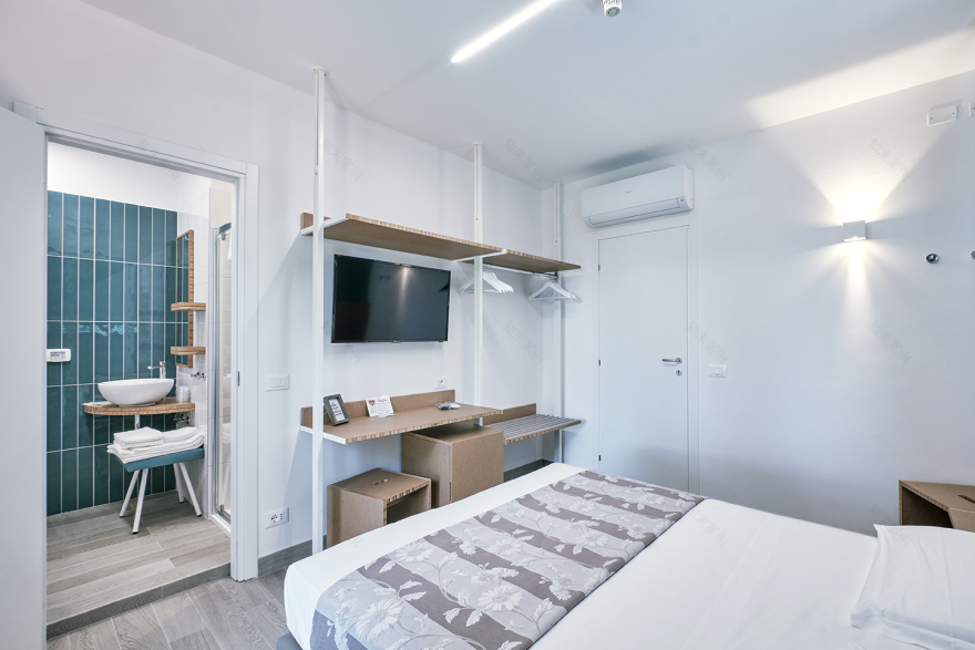 海沙共舞,简约几何的环保酒店设计-2