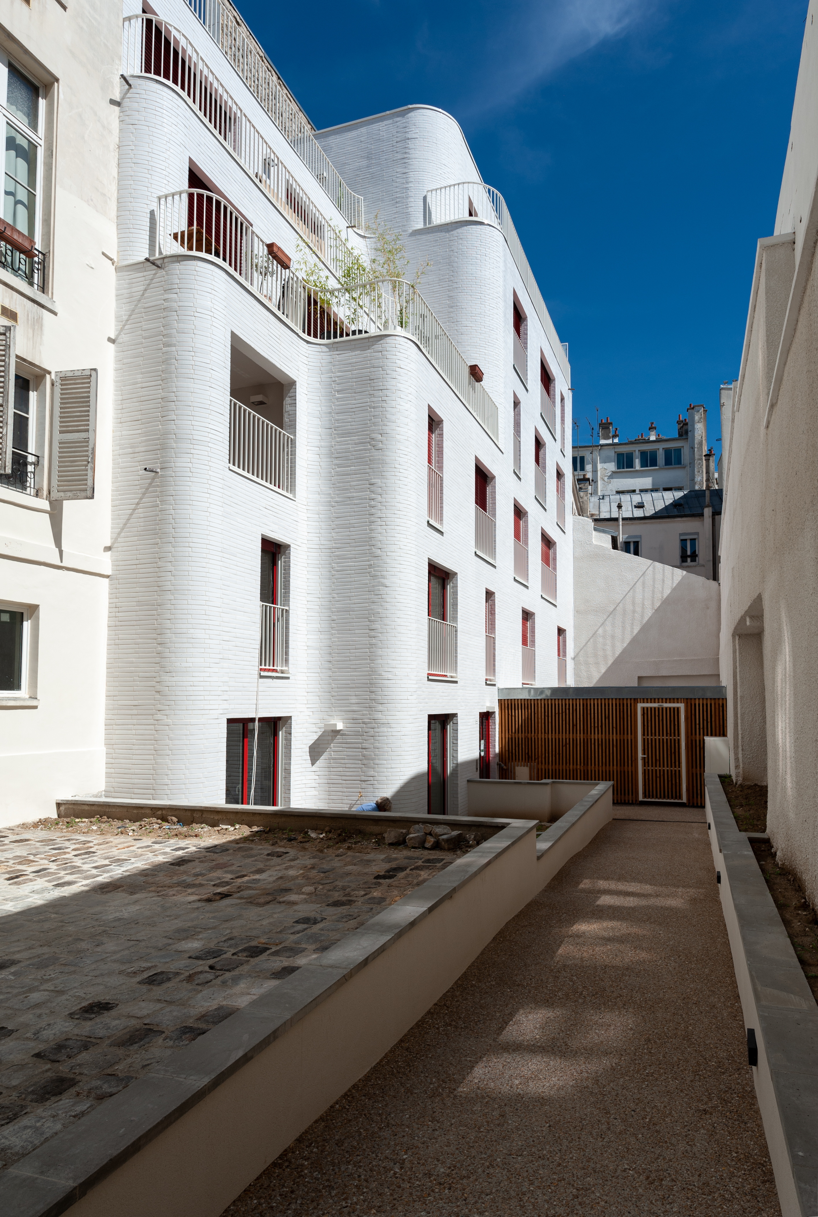 巴黎公寓建筑 | 修复与创新的完美结合-6