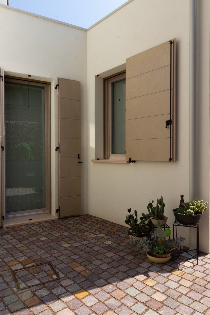 修复古城中心的“金色丰收之家”-16