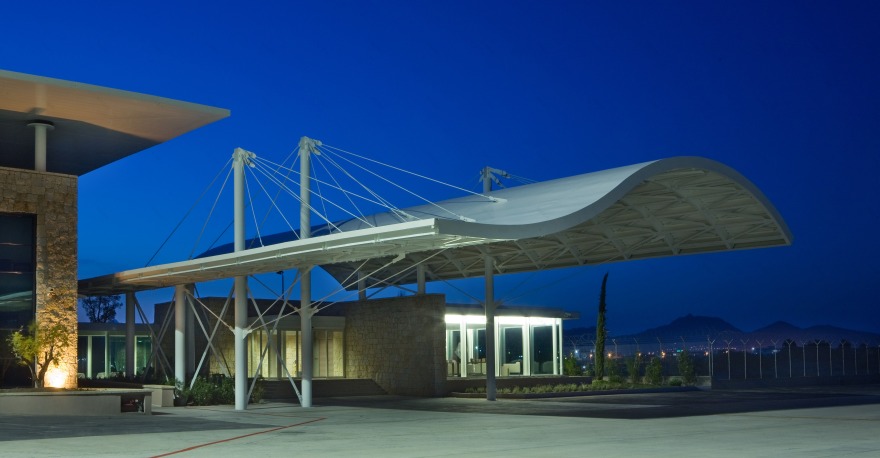 Olbia 机场别墅风格航站楼,精巧细节与自然融合-1