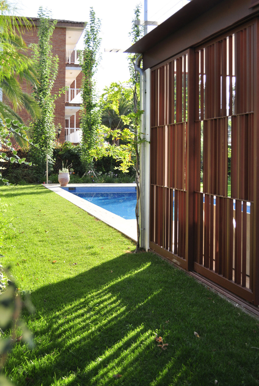 重塑 50 年代传统度假屋,连接室内外生活-4