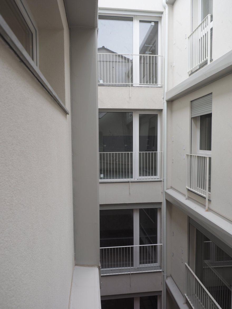 城市中心旧公寓翻新变身现代出租公寓-16