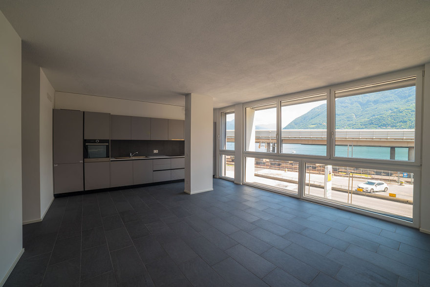 瑞士卢加诺湖畔别墅改建,金属质感与优雅湖景的完美融合-6