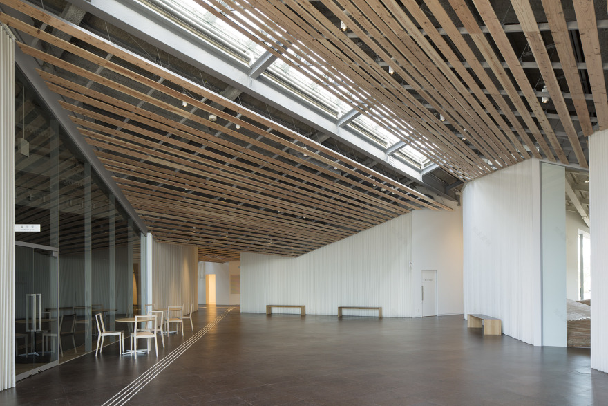 融入邻里景观的木质社区中心-7