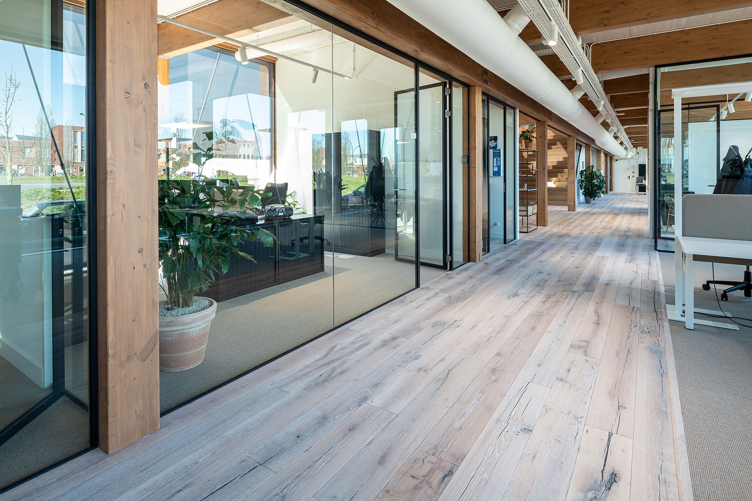 CO2 neutral office builing with reclaimed oak wooden flooring-9