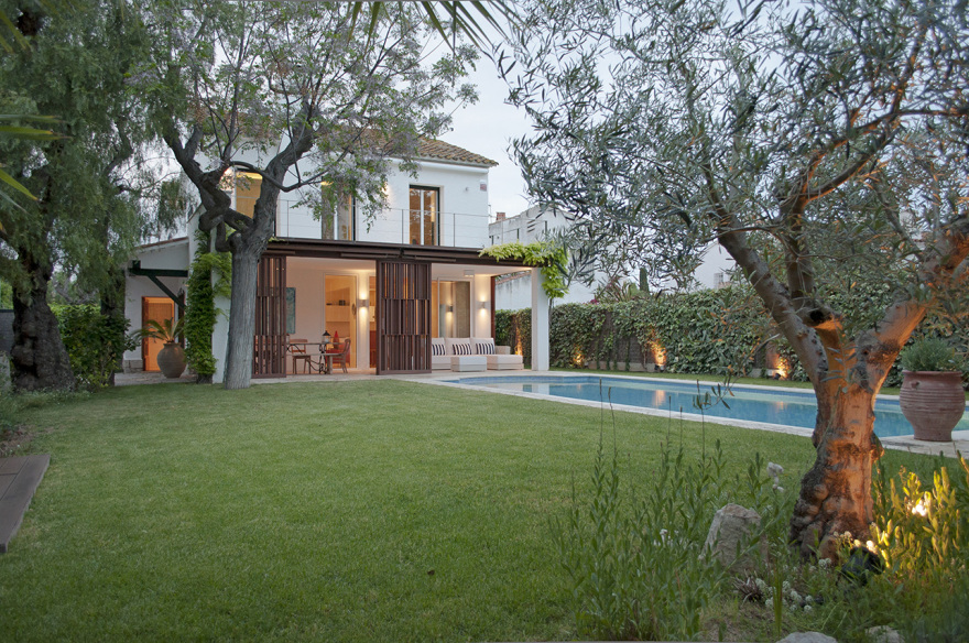 重塑 50 年代传统度假屋,连接室内外生活-16